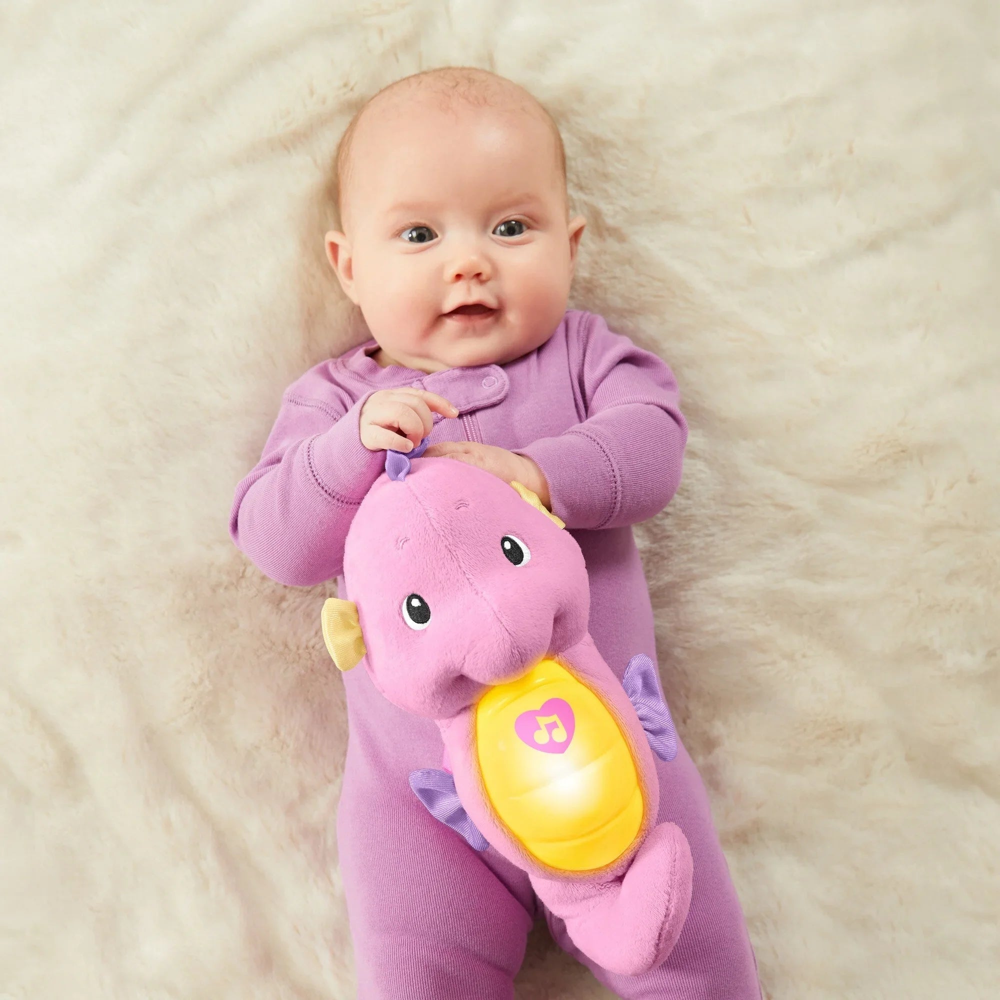 Fisher-Price Soothe & Glow Seahorse, Pink Plush Toy with Music, Ocean Sounds and Lights for Baby